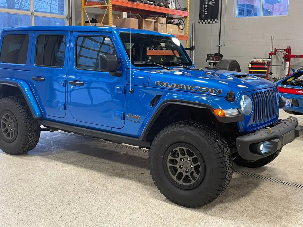 Blue Jeep Wrangler Rubicon 392 in the shop
