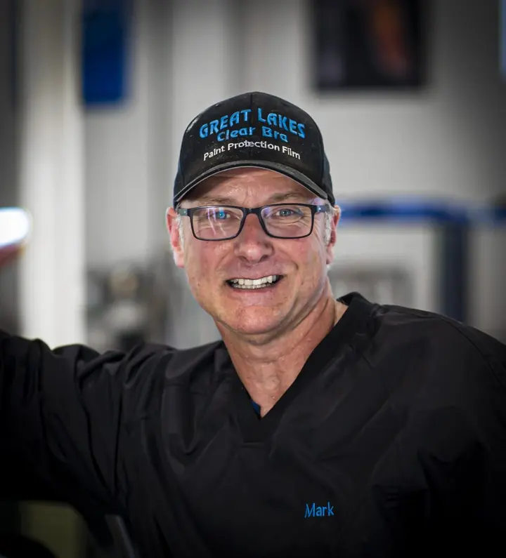 Mark, owner of Great Lakes Clear Bra, smiling in a Great Lakes Clear Bra cap